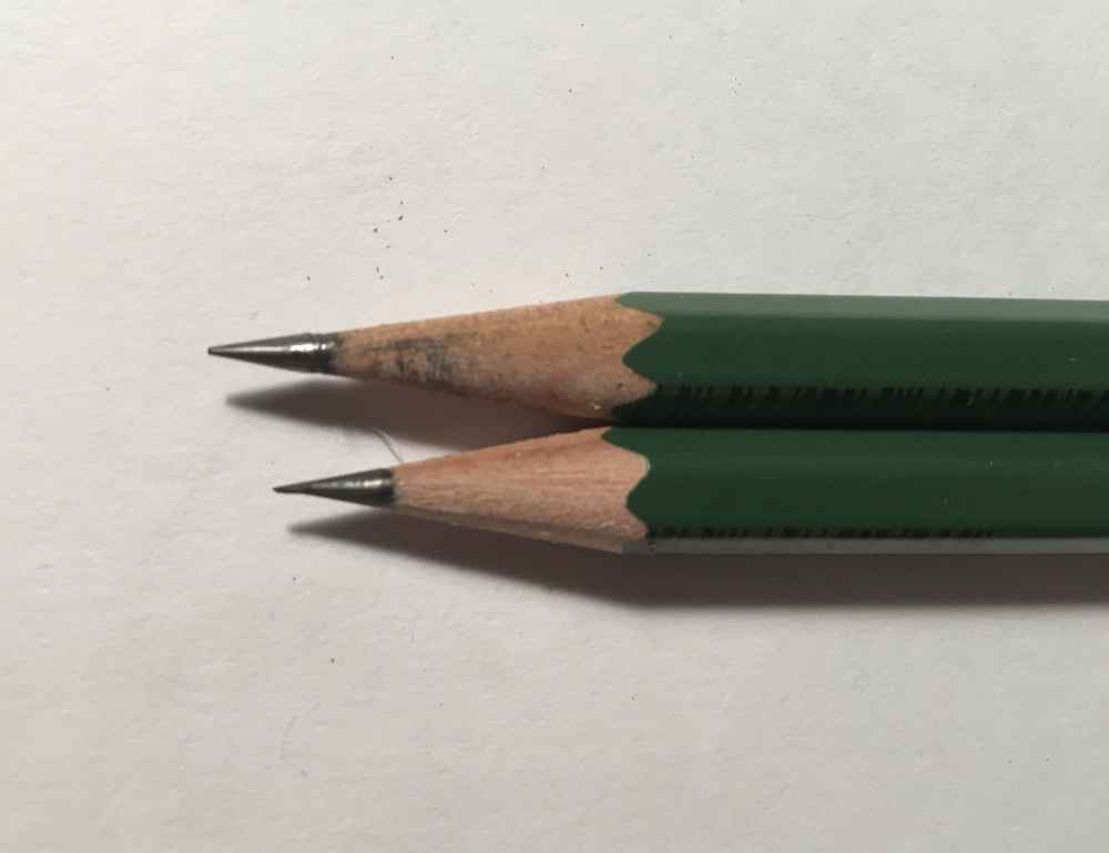 Tip Sharpening Comparison between Kum Automatic Longpoint pencil sharpener, top, and M+R Brass Bullet Sharpener, Bottom